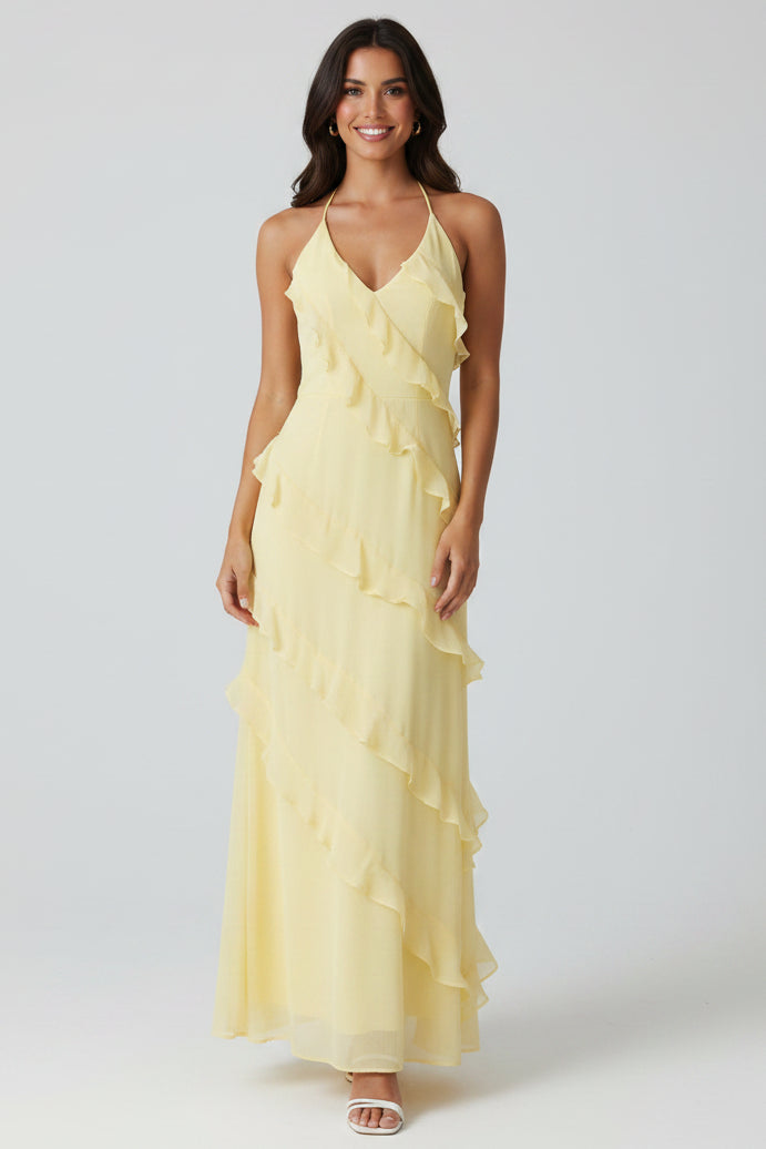 Women’s halter neck maxi dress with ruffle details and flowing silhouette