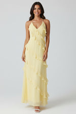 Women’s halter neck maxi dress with ruffle details and flowing silhouette