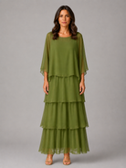 Women’s layered chiffon maxi dress with flowing sleeves, a relaxed full-length silhouette, and soft draped detailing for weddings and elegant occasions.