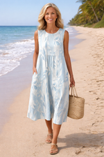 Women’s leaf print midi dress with relaxed fit and flowing silhouette