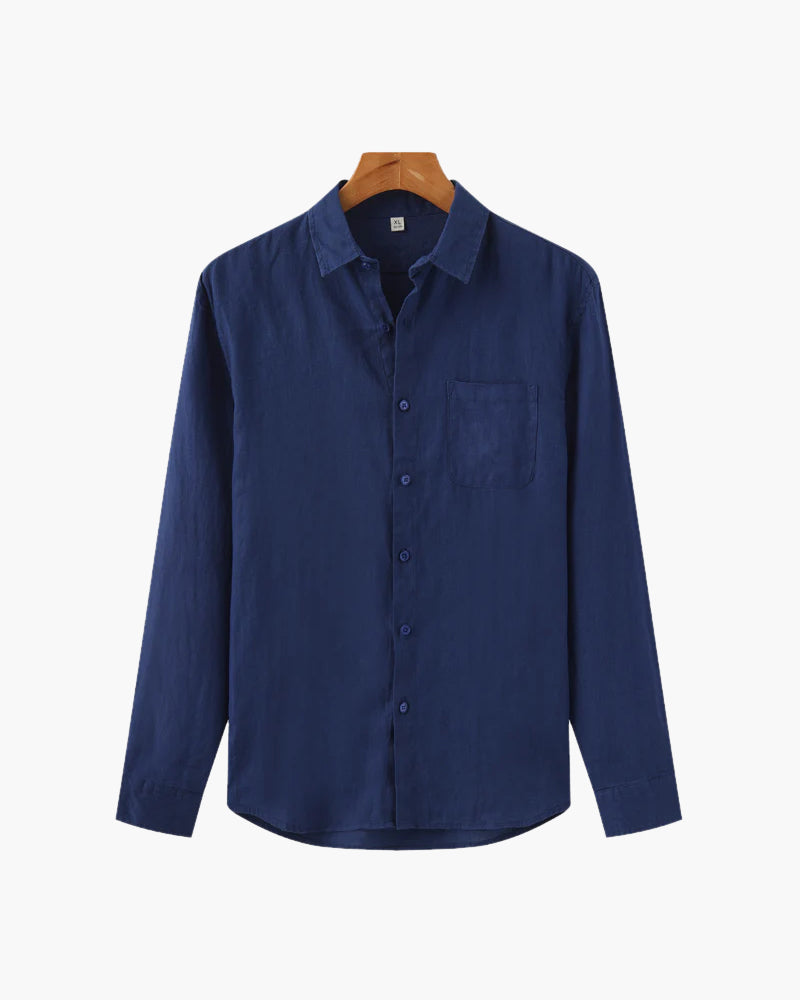 Blue shirt on a hanger against a white background