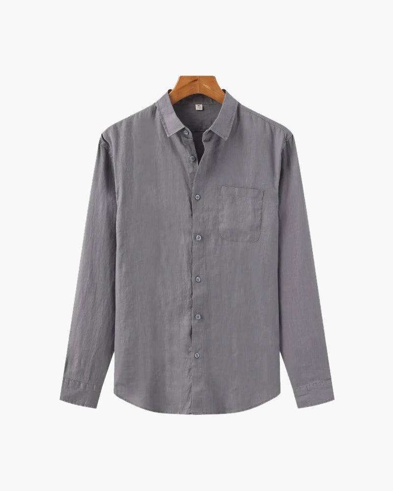 Gray button-up shirt on a hanger against a white background