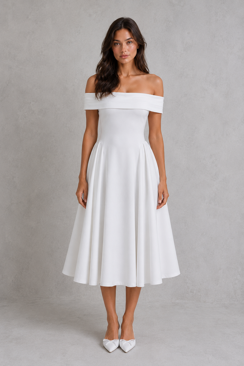 Woman wearing a white off-shoulder dress against a gray background