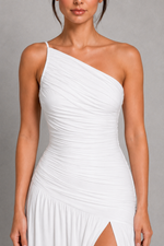White one-shoulder dress with a gray background