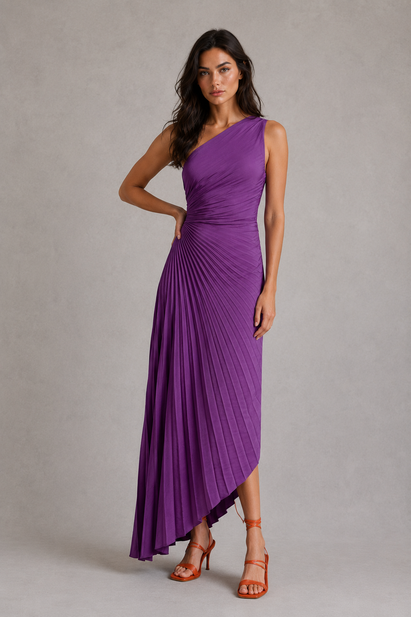Woman wearing a purple one-shoulder dress against a gray background