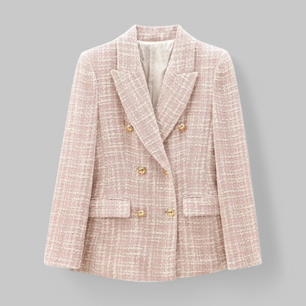 Pink textured blazer with gold buttons on a gray background