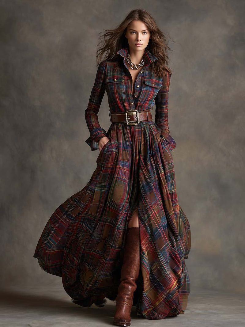 Woman wearing a long plaid dress with brown boots against a gray background