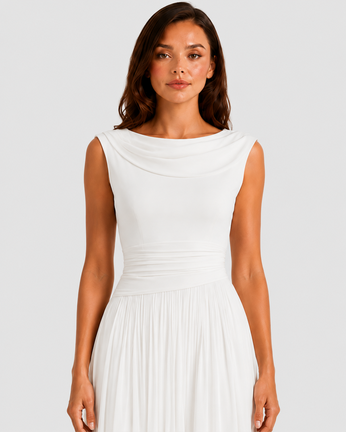 Woman wearing a white dress against a plain background