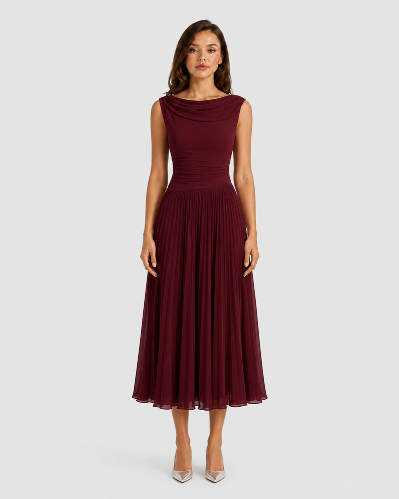 Woman wearing a burgundy dress on a white background