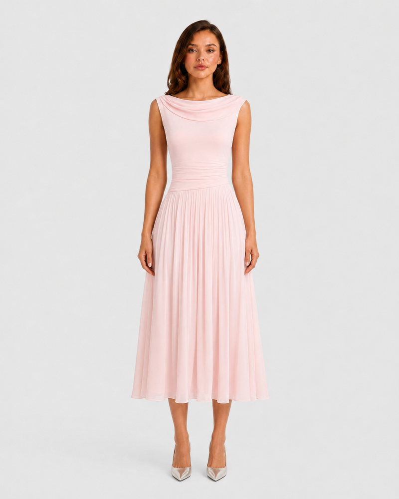 Woman wearing a pink dress on a light gray background