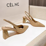 Beige high-heeled shoes on a white surface with 'Cél.ne' branding in the background.