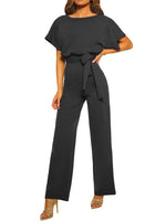Black jumpsuit worn by a model on a white background