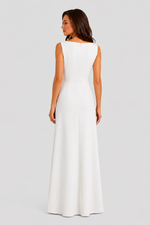 Women’s sleeveless maxi dress with boat neckline, draped waist detail, and wrap-style front panel