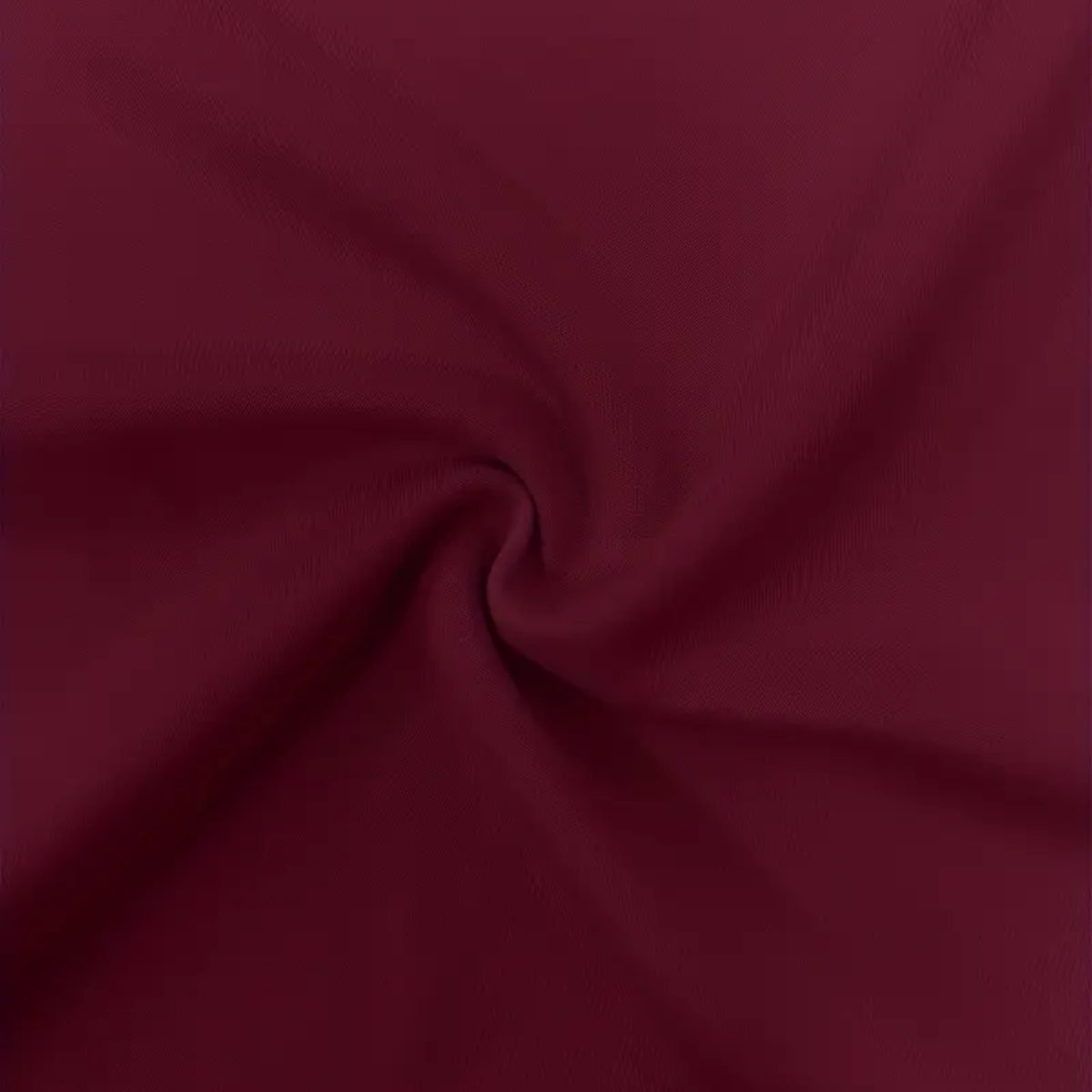 Close-up of dark red fabric with folds