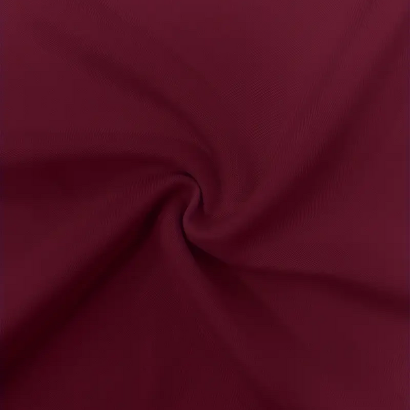 Close-up of dark red fabric with folds