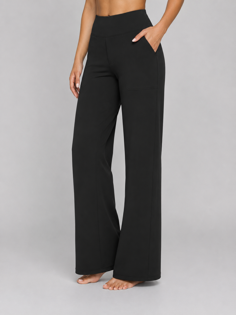 Black wide-leg pants worn by a person on a gray background