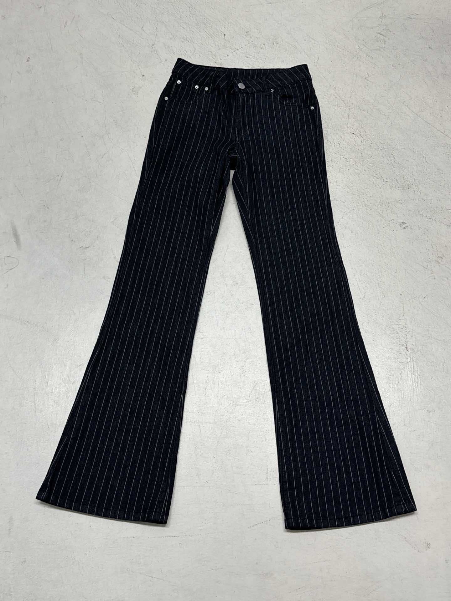 Black pinstripe pants on a light gray background