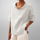Women’s V-neck collared relaxed fit blouse with soft drape