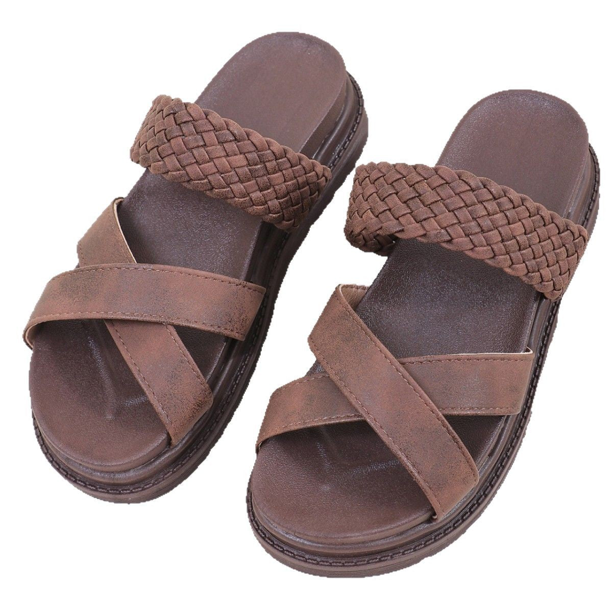 Pair of brown sandals with woven straps on a white background